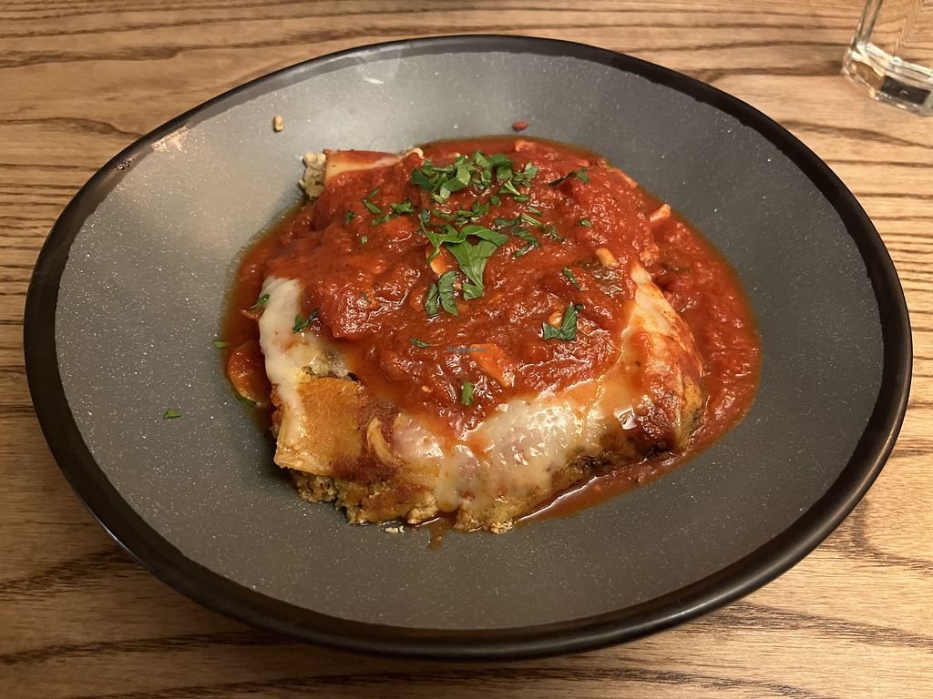 Strada Italiano signature dishes LasagnaFig and Goat Cheese PizzaScallops Risotto
